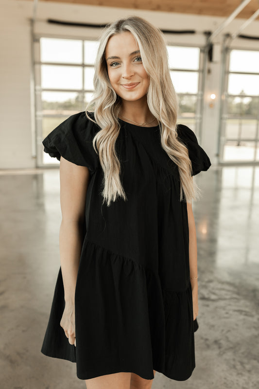 ASYMMETRIC BABYDOLL MINI DRESS