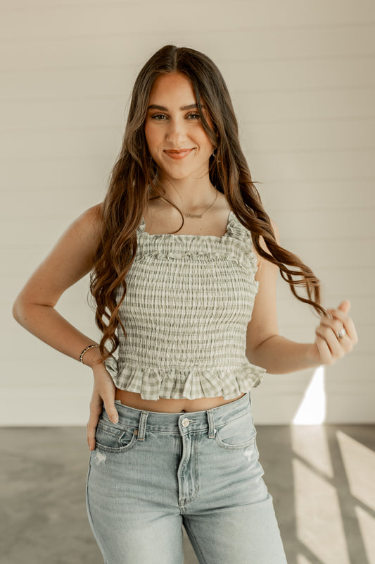 GINGHAM SLEEVELESS PEPLUM SMOCKED TOP